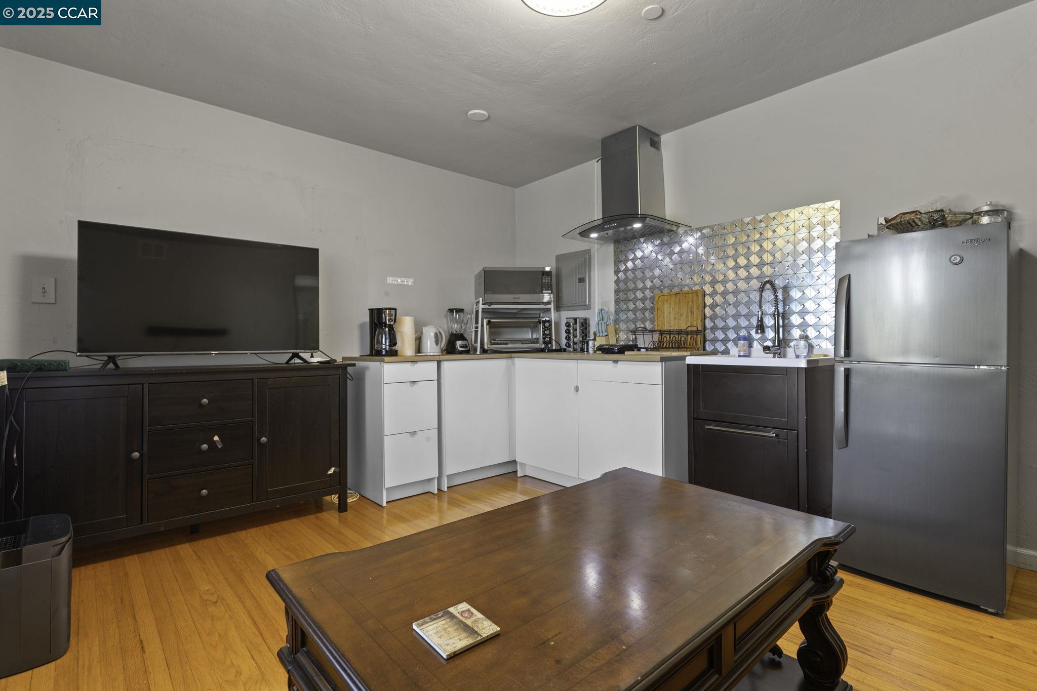 1910 San Miguel Drive Walnut Creek, CA 94596 - Photo 50 of 58 a kitchen with stainless steel appliances granite countertop a refrigerator a stove and a sink