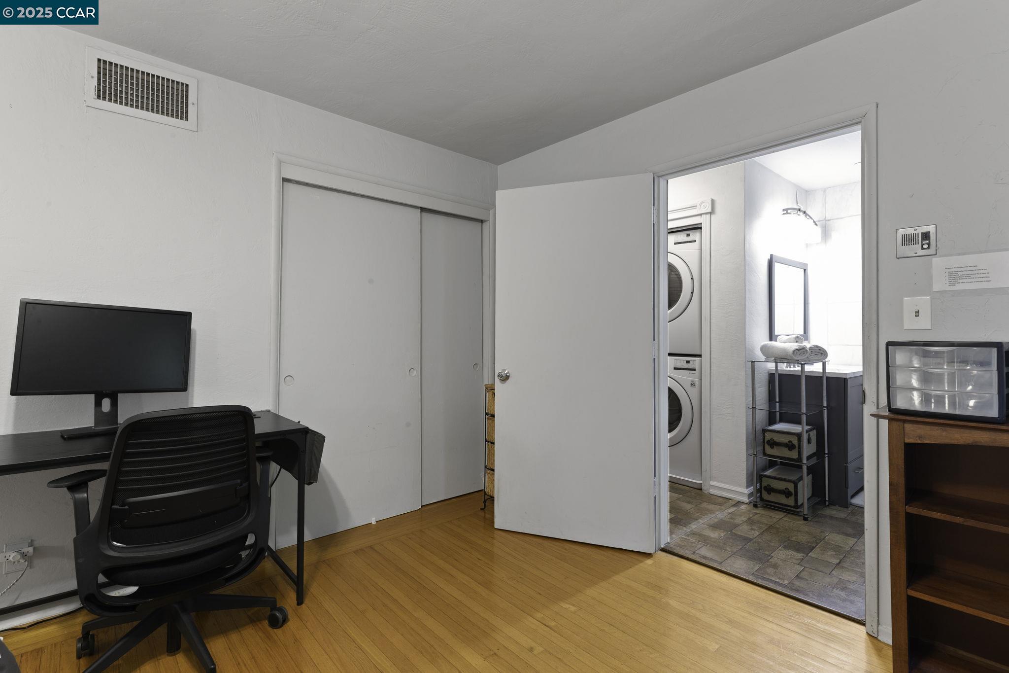 1910 San Miguel Drive Walnut Creek, CA 94596 - Photo 53 of 58 a bedroom with a bed and a flat screen tv