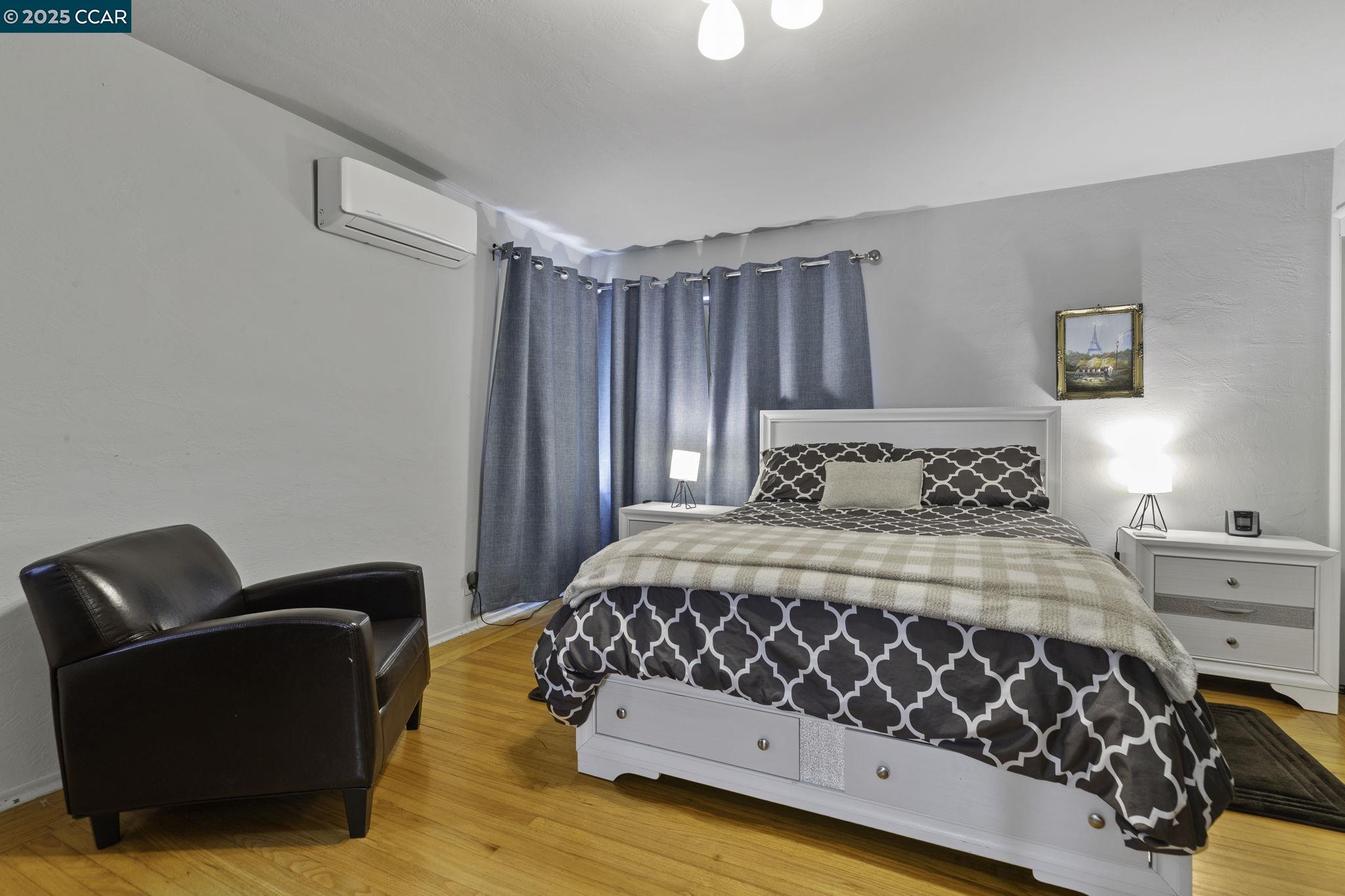 1910 San Miguel Drive Walnut Creek, CA 94596 - Photo 54 of 58 a bedroom with a bed couch and a window