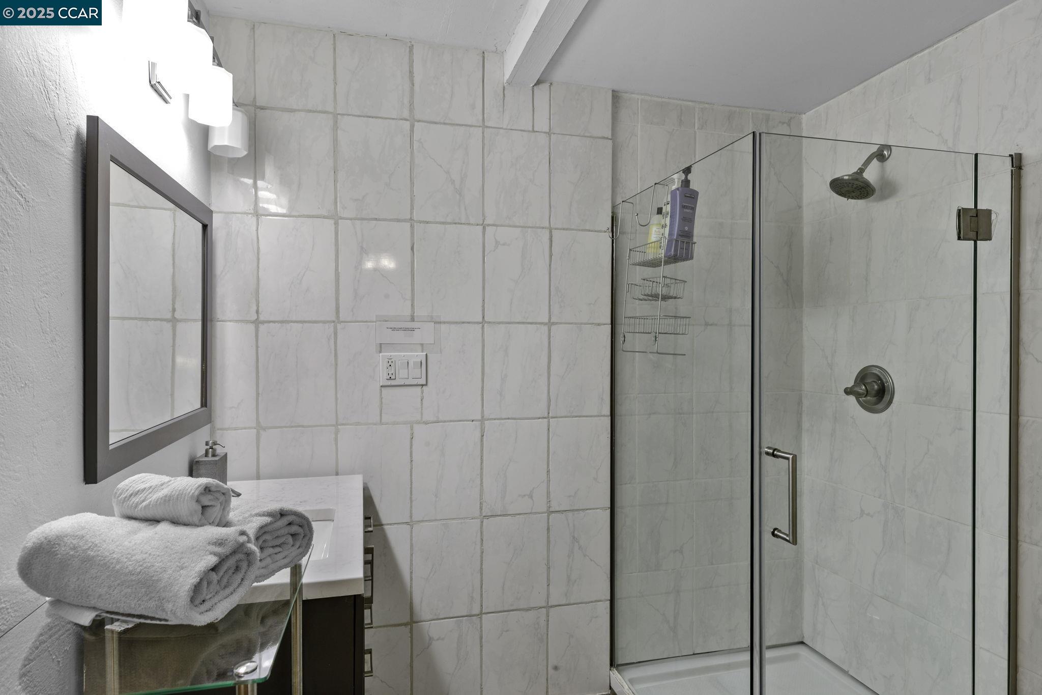 1910 San Miguel Drive Walnut Creek, CA 94596 - Photo 58 of 58 a bathroom with a sink and shower