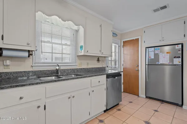 $824,500 | 411 34th Street, Sunset Beach, NC 28468