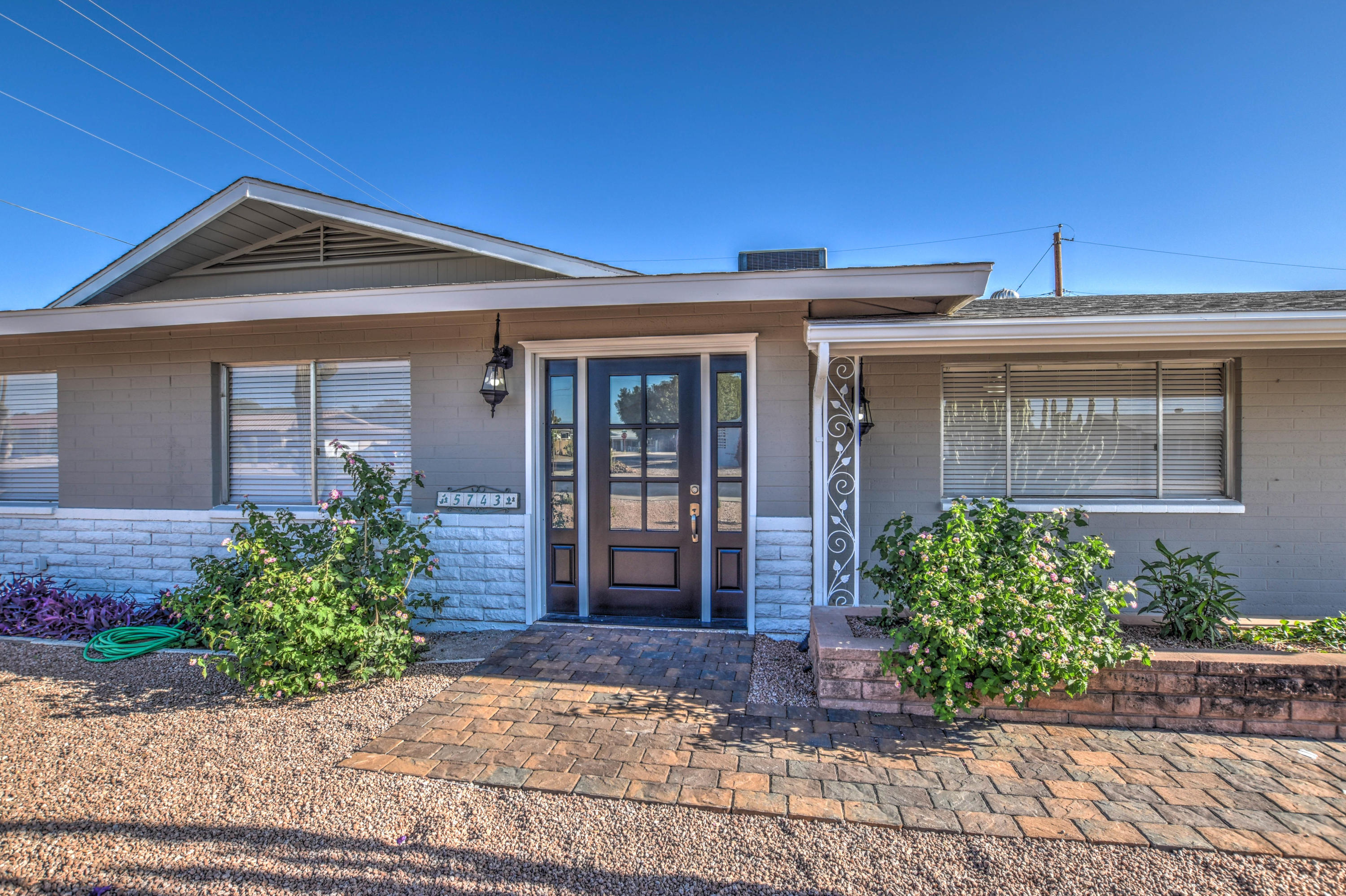 5743 Casper Road Mesa, AZ 85205 - Photo 25 of 43 front view of a house