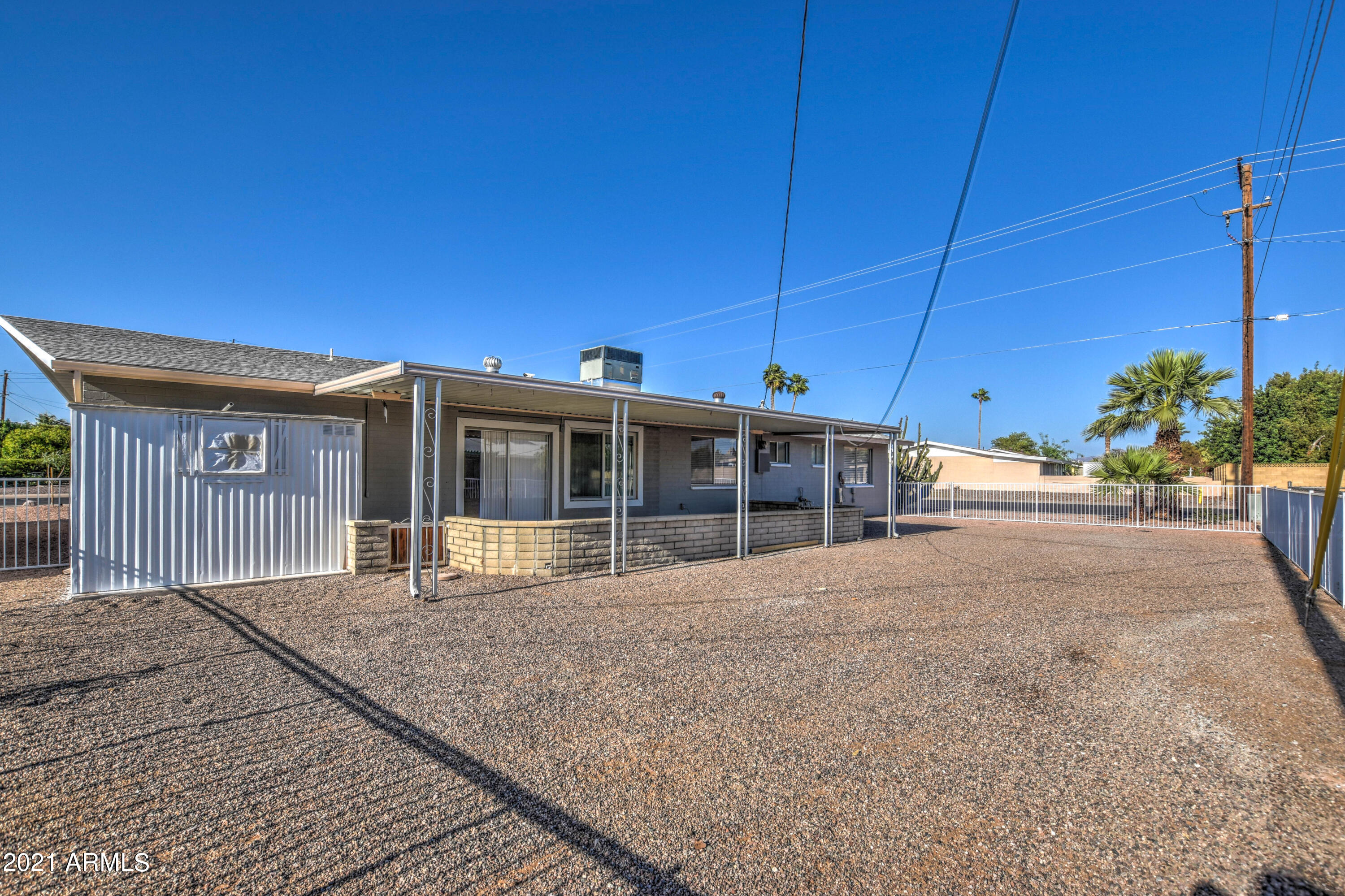 5743 Casper Road Mesa, AZ 85205 - Photo 41 of 43 a view of a house next to a yard