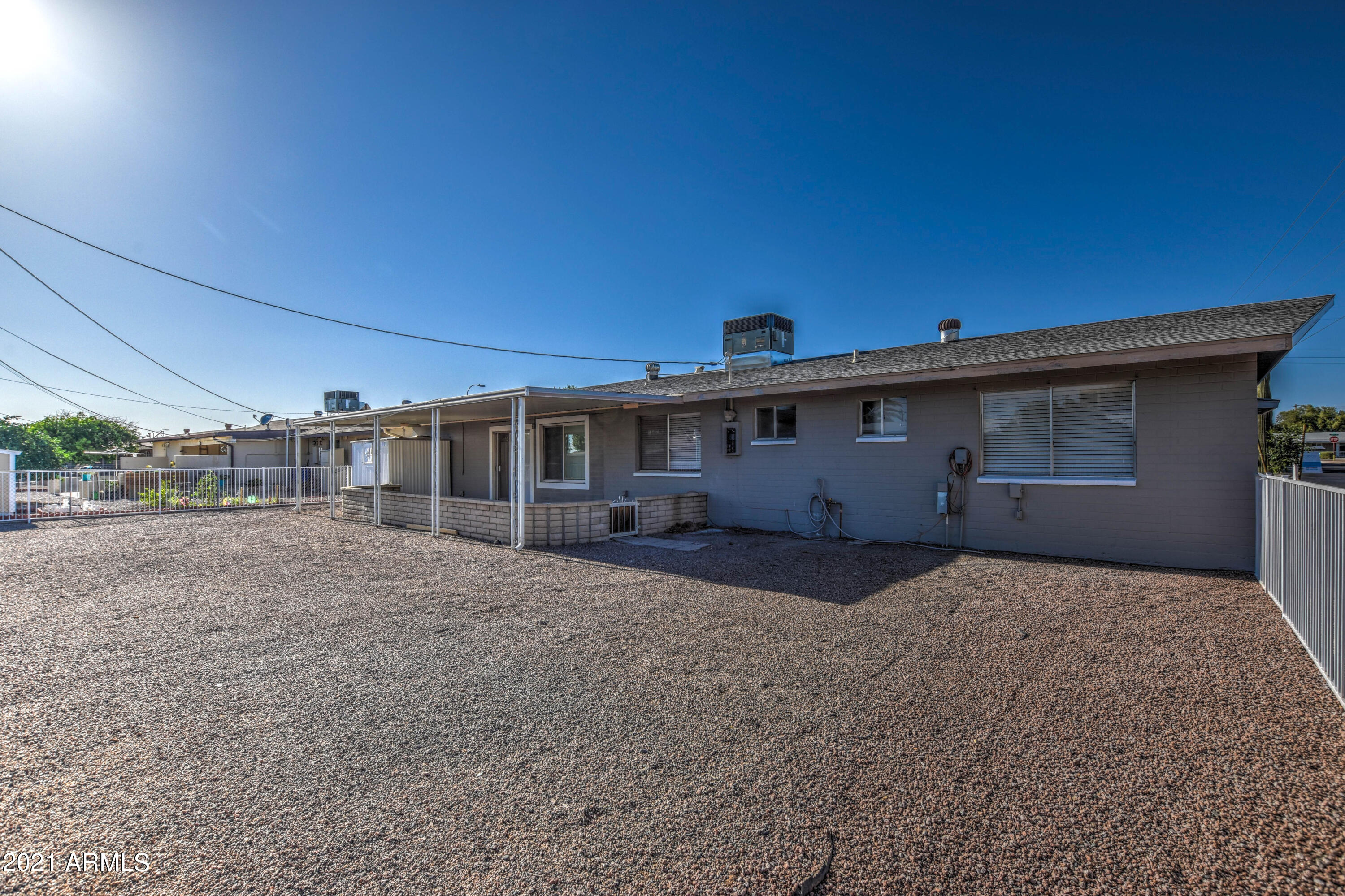 5743 Casper Road Mesa, AZ 85205 - Photo 42 of 43 a view of a house next to a big yard