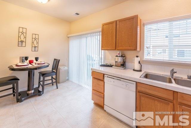 315 Dawson Jacob Lane Reno, NV 89503 - Photo 6 of 16 a kitchen with a sink cabinets and window