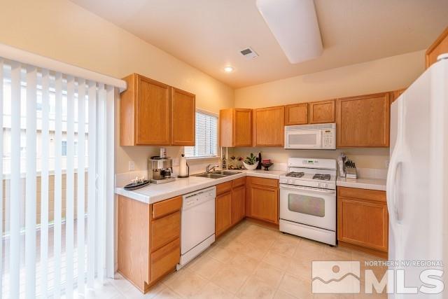 315 Dawson Jacob Lane Reno, NV 89503 - Photo 8 of 16 a kitchen with a sink stove top oven and refrigerator
