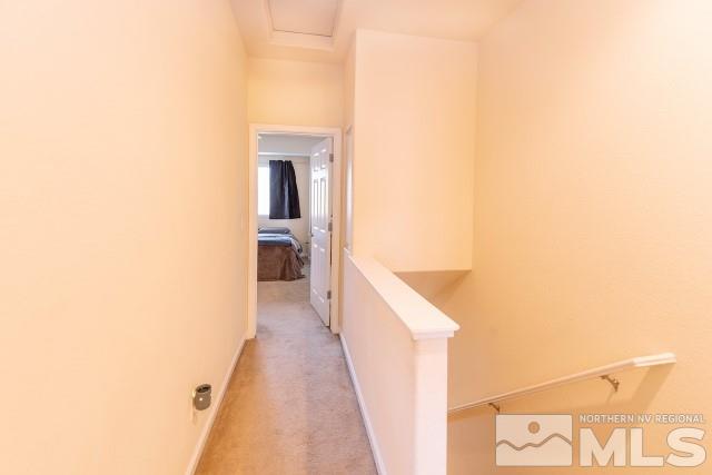 315 Dawson Jacob Lane Reno, NV 89503 - Photo 10 of 16 a view of a hallway with wooden floor and a large window
