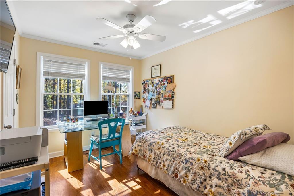 1505 Old John Ward Road Marietta, GA 30064 - Photo 36 of 46 a bedroom with a bed and furniture