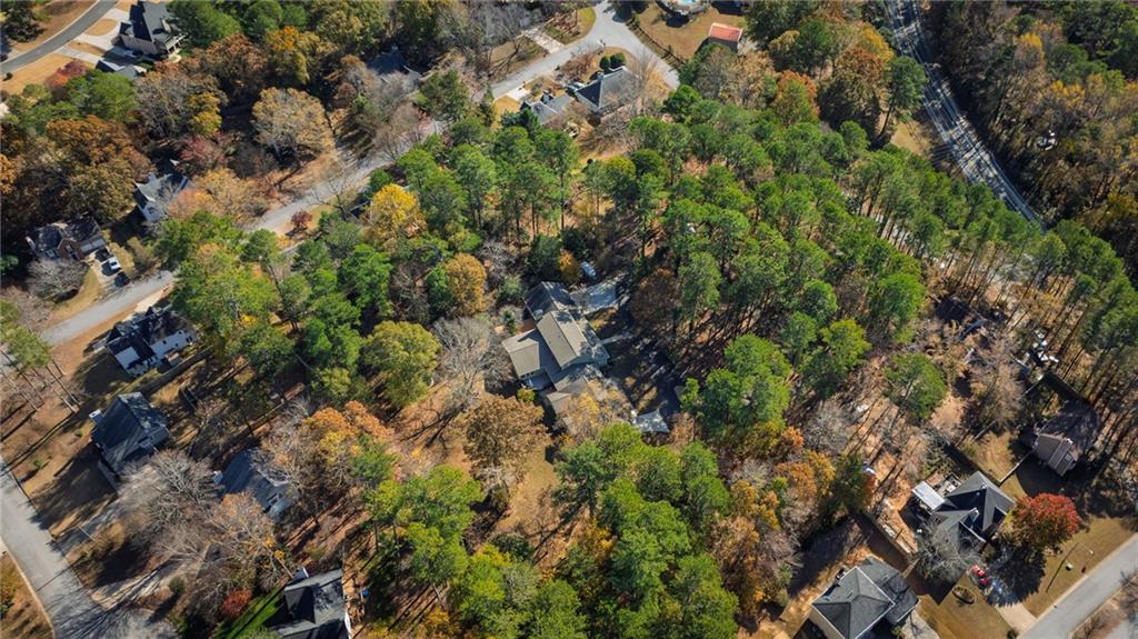 1505 Old John Ward Road Marietta, GA 30064 - Photo 45 of 46 a view of a house with a lush green forest