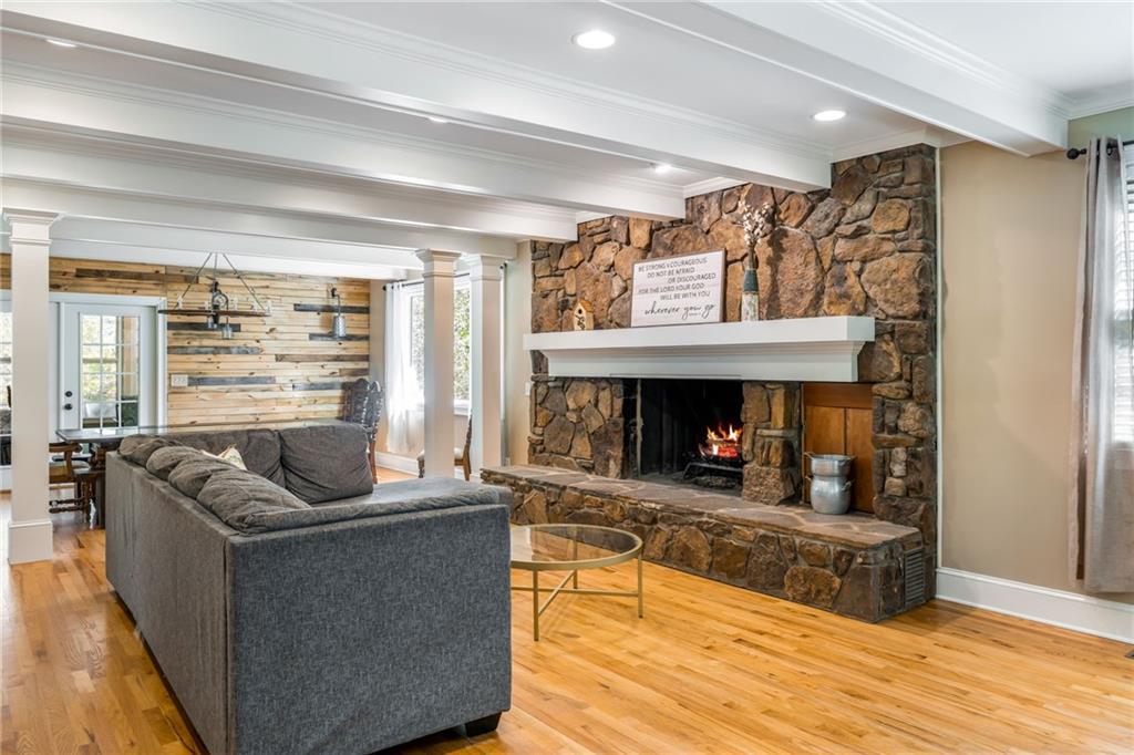 1505 Old John Ward Road Marietta, GA 30064 - Photo 5 of 46 a living room with furniture and a fireplace