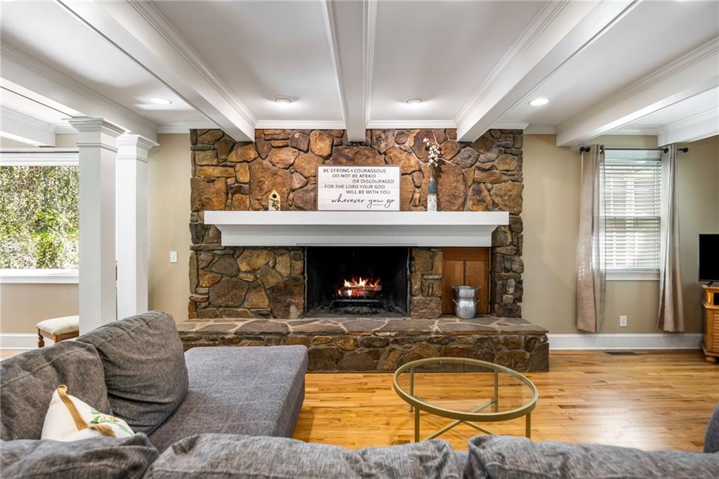 1505 Old John Ward Road Marietta, GA 30064 - Photo 7 of 46 a living room with furniture a fireplace and window