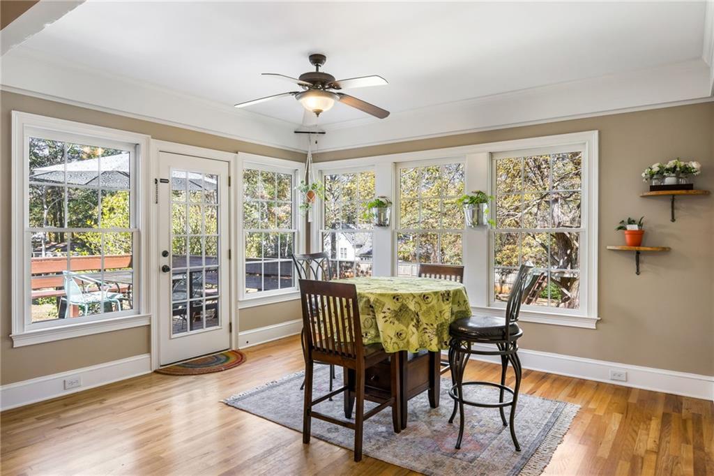 1505 Old John Ward Road Marietta, GA 30064 - Photo 9 of 46 a view of a dining room with furniture window and outside view