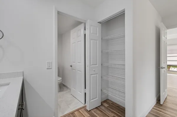 an aerial view of a house with a garden and swimming pool