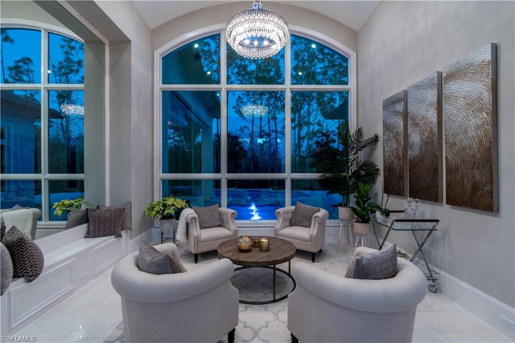 4478 Wayside Drive Naples, FL 34119 - Photo 14 of 31 a view of a livingroom with furniture and window