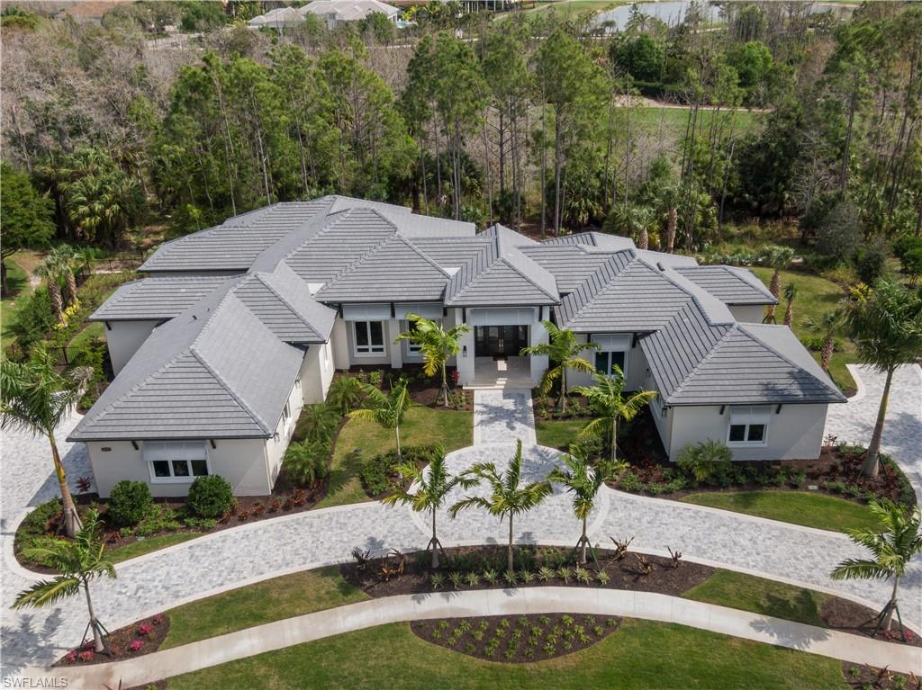 4478 Wayside Drive Naples, FL 34119 - Photo 8 of 31 an aerial view of a house with garden