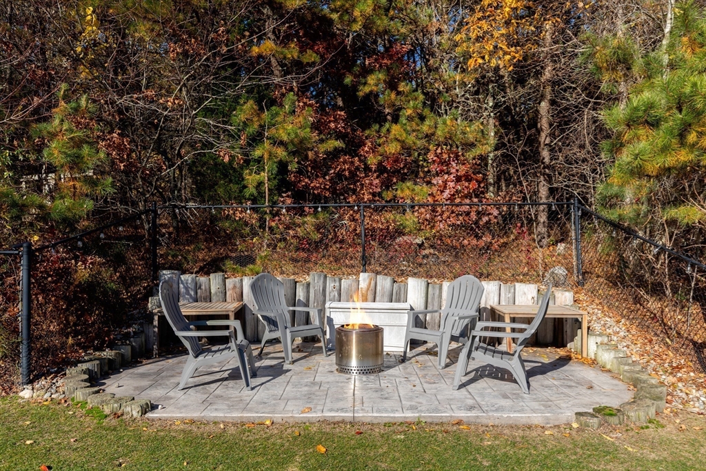 19 Oakbluff Road Bourne, MA 02562 - Photo 13 of 42 a building outdoor space with patio furniture