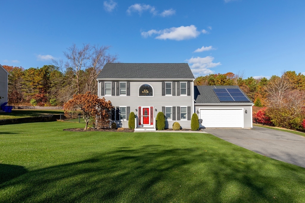 19 Oakbluff Road Bourne, MA 02562 - Photo 3 of 42 a view of a house with a yard