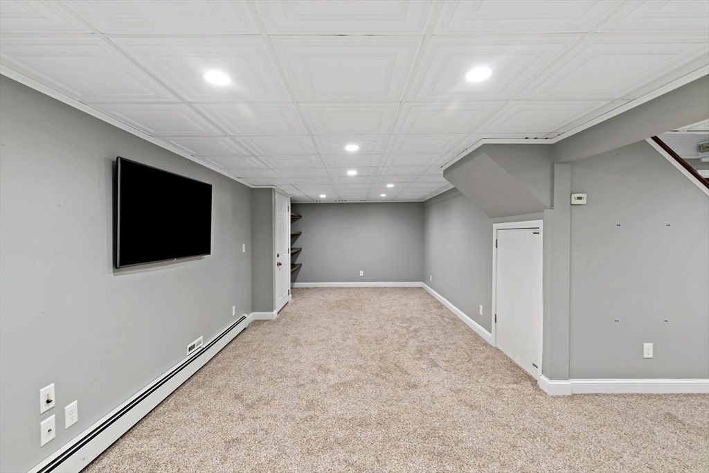 19 Oakbluff Road Bourne, MA 02562 - Photo 40 of 42 a view of a livingroom with an empty space and a window