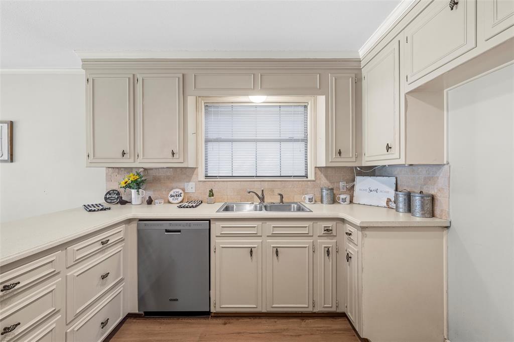 3601 Willow Bend Circle Waco, TX 76708 - Photo 11 of 37 a kitchen with a sink and cabinets