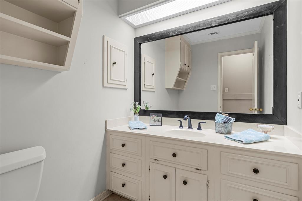 3601 Willow Bend Circle Waco, TX 76708 - Photo 14 of 37 a bathroom with a granite countertop sink vanity and mirror