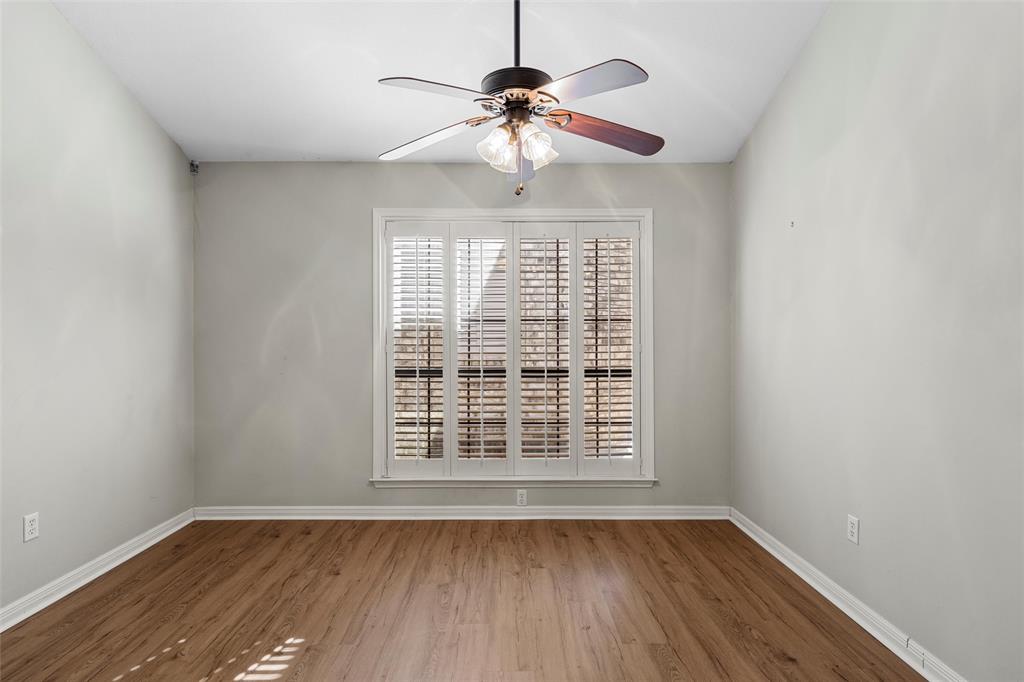 3601 Willow Bend Circle Waco, TX 76708 - Photo 16 of 37 a view of an empty room with wooden floor and a window