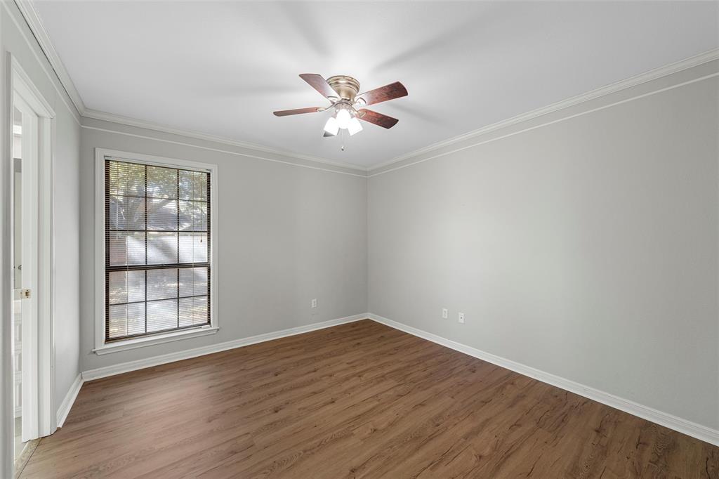 3601 Willow Bend Circle Waco, TX 76708 - Photo 23 of 37 wooden floor in an empty room with a window