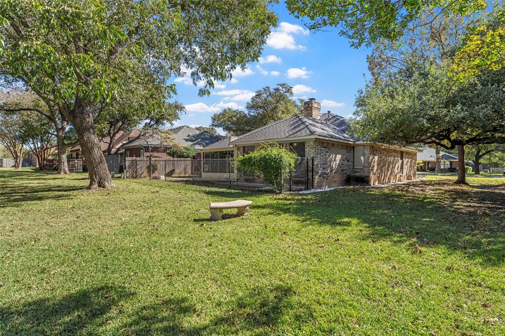 3601 Willow Bend Circle Waco, TX 76708 - Photo 36 of 37 a front view of a house with garden