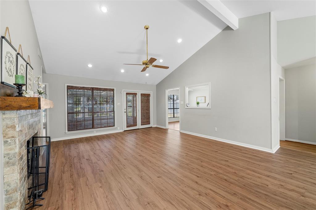 3601 Willow Bend Circle Waco, TX 76708 - Photo 4 of 37 an empty room with wooden floor and windows