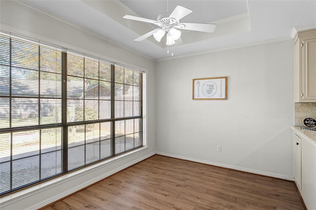 3601 Willow Bend Circle Waco, TX 76708 - Photo 8 of 37 wooden floor in an empty room with a window
