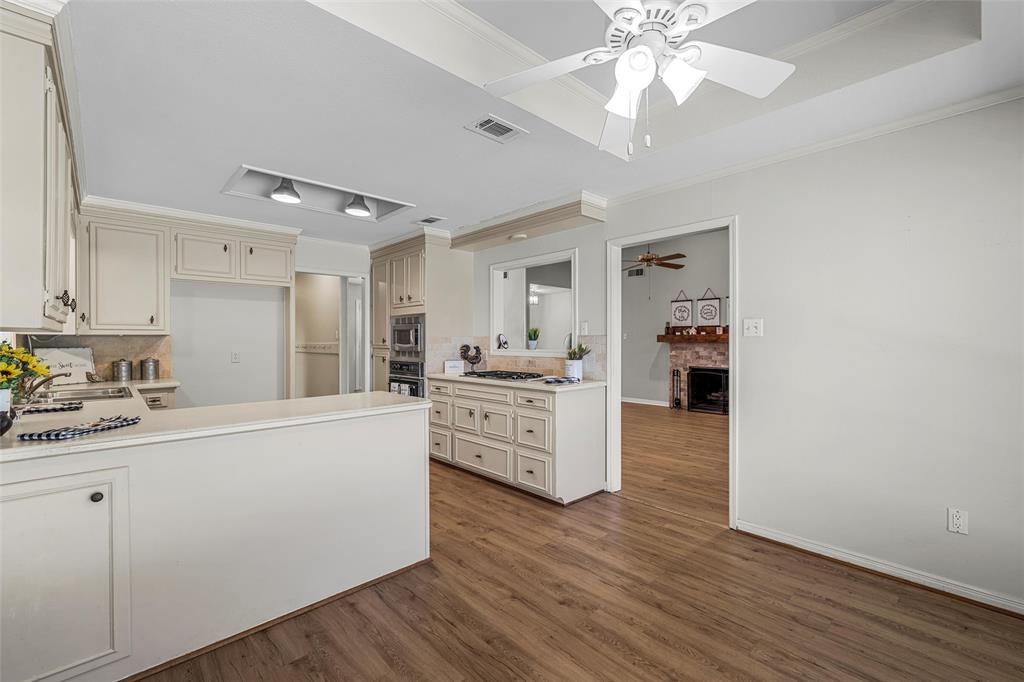 3601 Willow Bend Circle Waco, TX 76708 - Photo 9 of 37 a large white kitchen with cabinets