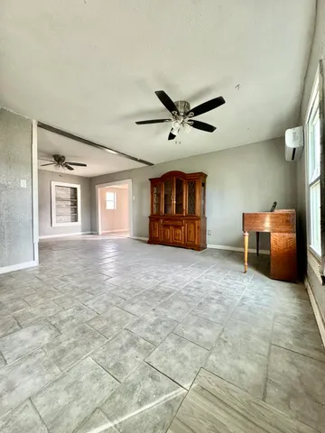 a view of a livingroom with a workspace