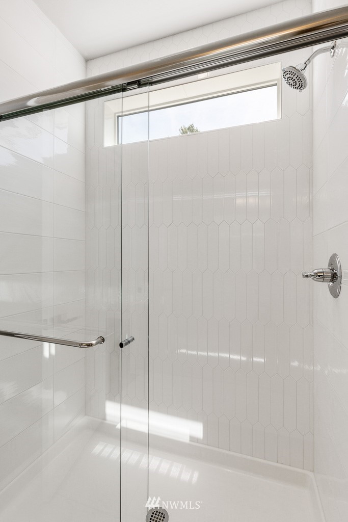 22921 31st Avenue Southeast Bothell, WA 98021 - Photo 8 of 16 a bathroom with a shower