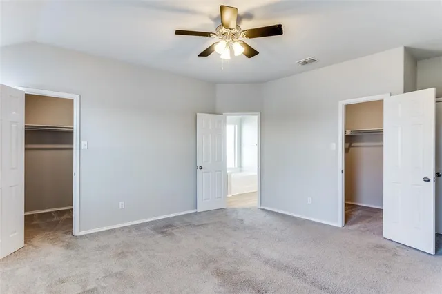 a bathroom with a sink and a mirror with bathtub