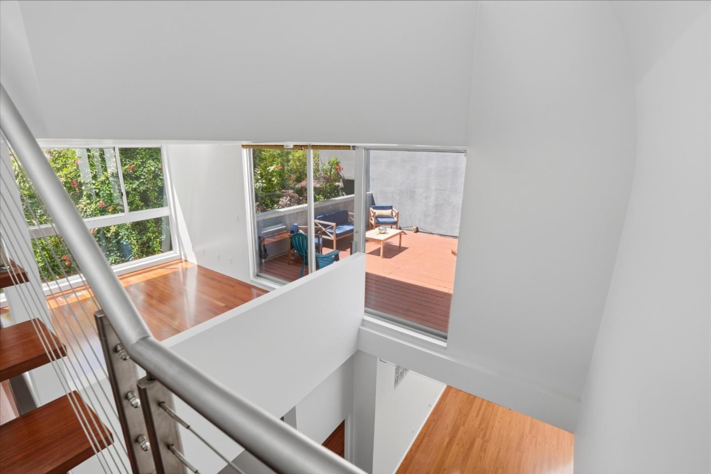 2709 Tenth Street, Unit C Berkeley, CA 94710 - Photo 22 of 44 view of living room with furniture and large windows