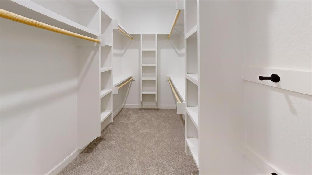 2509 Windmill Lane Longview, TX 75601 - Photo 29 of 35 Spacious closet with light colored carpet