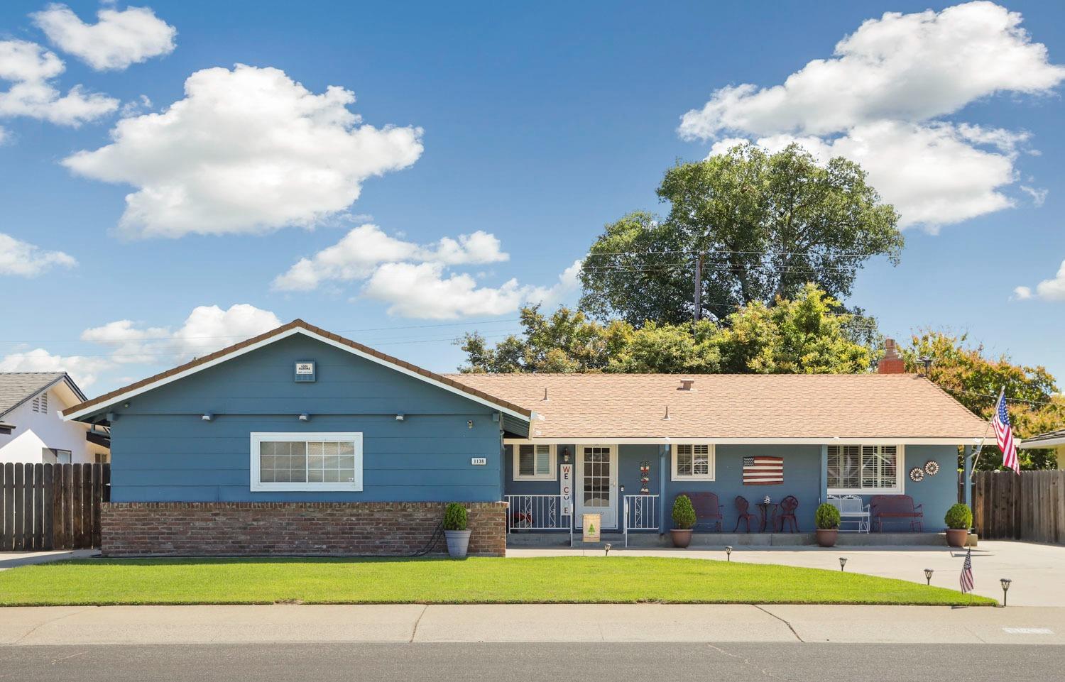 1138 Devine Drive Lodi, CA 95240 - Photo 1 of 1 a view of front of house with a yard