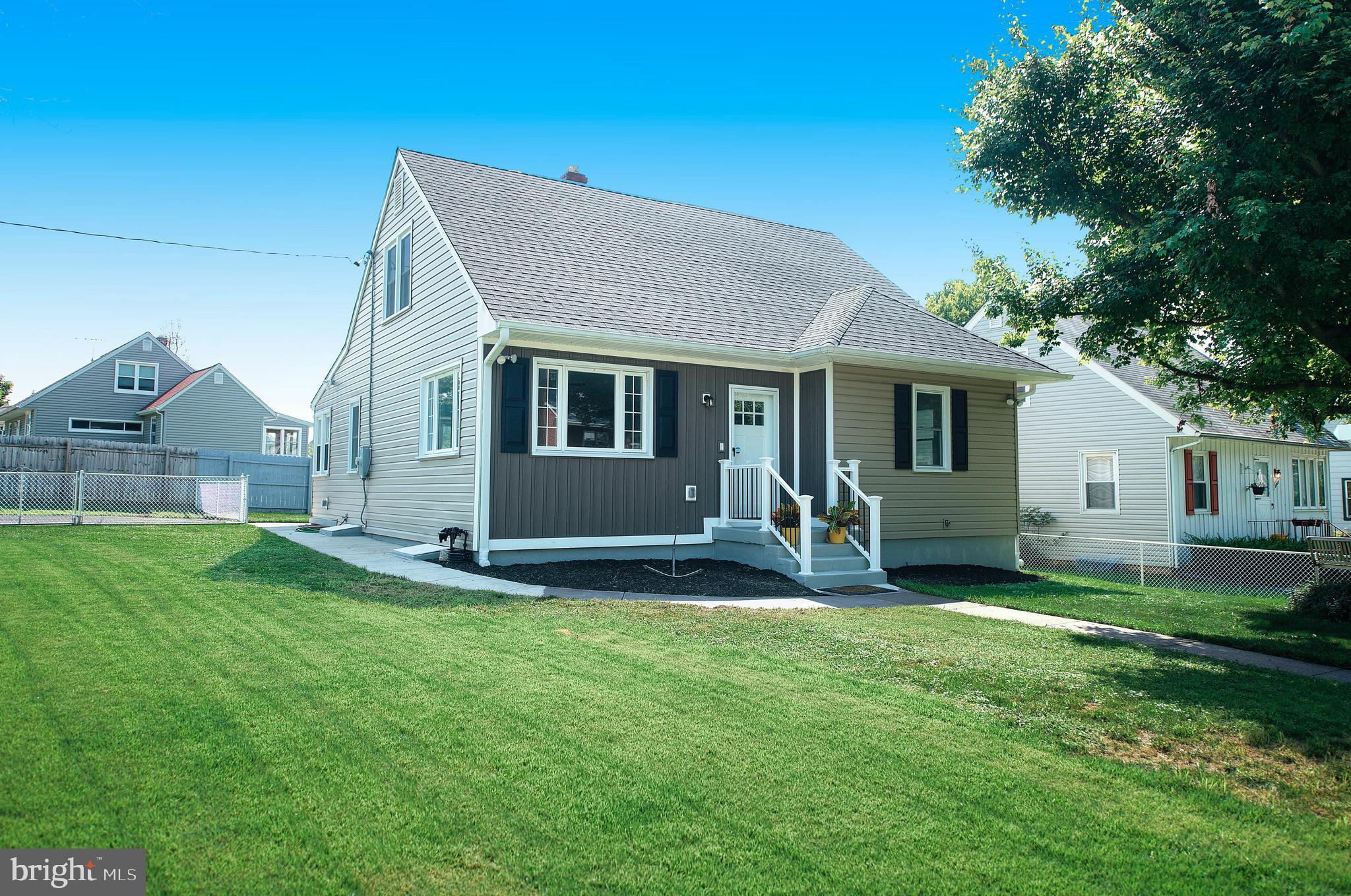 8205 Oakleigh Road Baltimore, MD 21234 - Photo 2 of 52 a view of a house with a yard and a patio