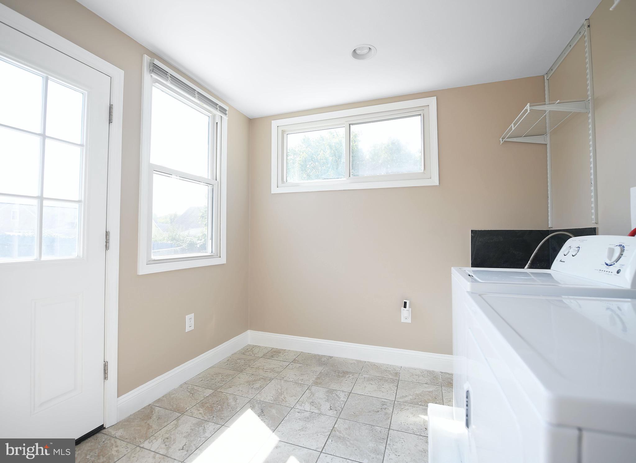 8205 Oakleigh Road Baltimore, MD 21234 - Photo 20 of 52 a view of utility room and bedroom