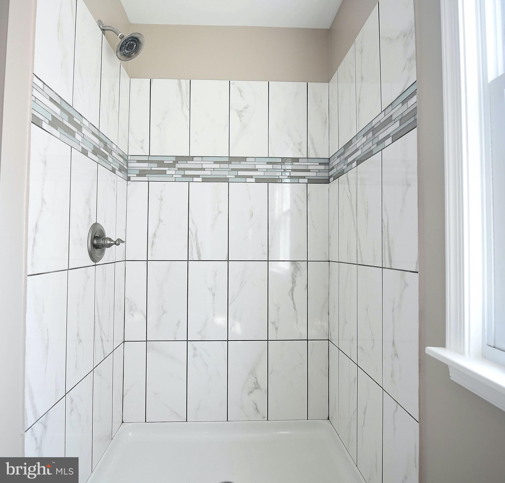 8205 Oakleigh Road Baltimore, MD 21234 - Photo 27 of 52 a bathroom with a shower