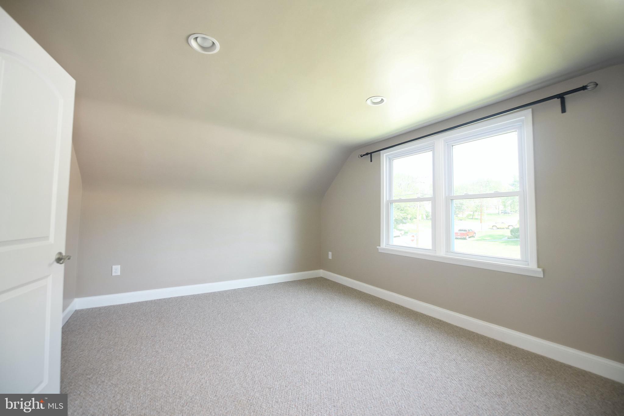 8205 Oakleigh Road Baltimore, MD 21234 - Photo 35 of 52 an empty room with a window