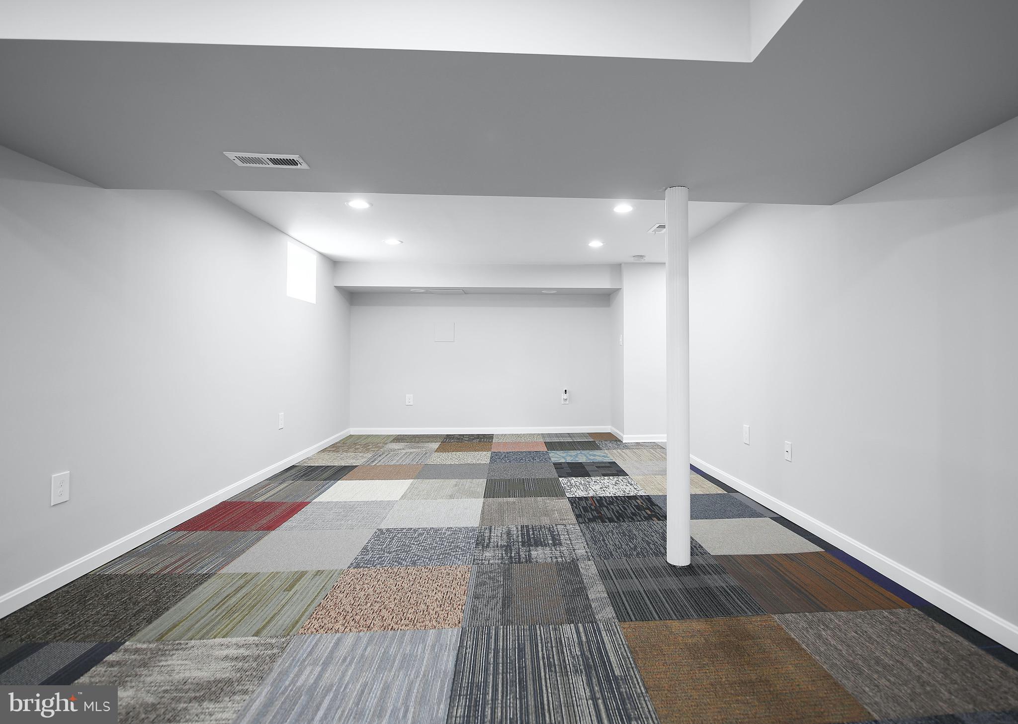 8205 Oakleigh Road Baltimore, MD 21234 - Photo 40 of 52 a view of a room with wooden floor