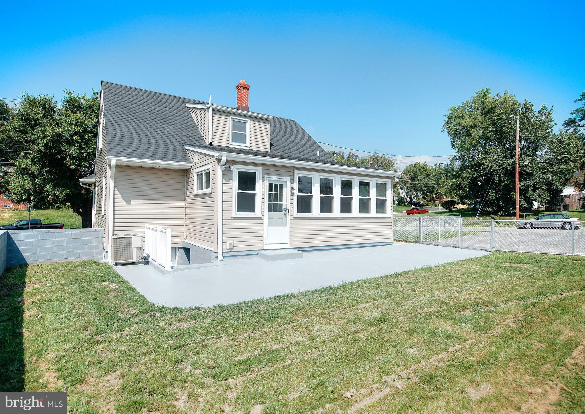 8205 Oakleigh Road Baltimore, MD 21234 - Photo 42 of 52 a view of a house with backyard and sitting area