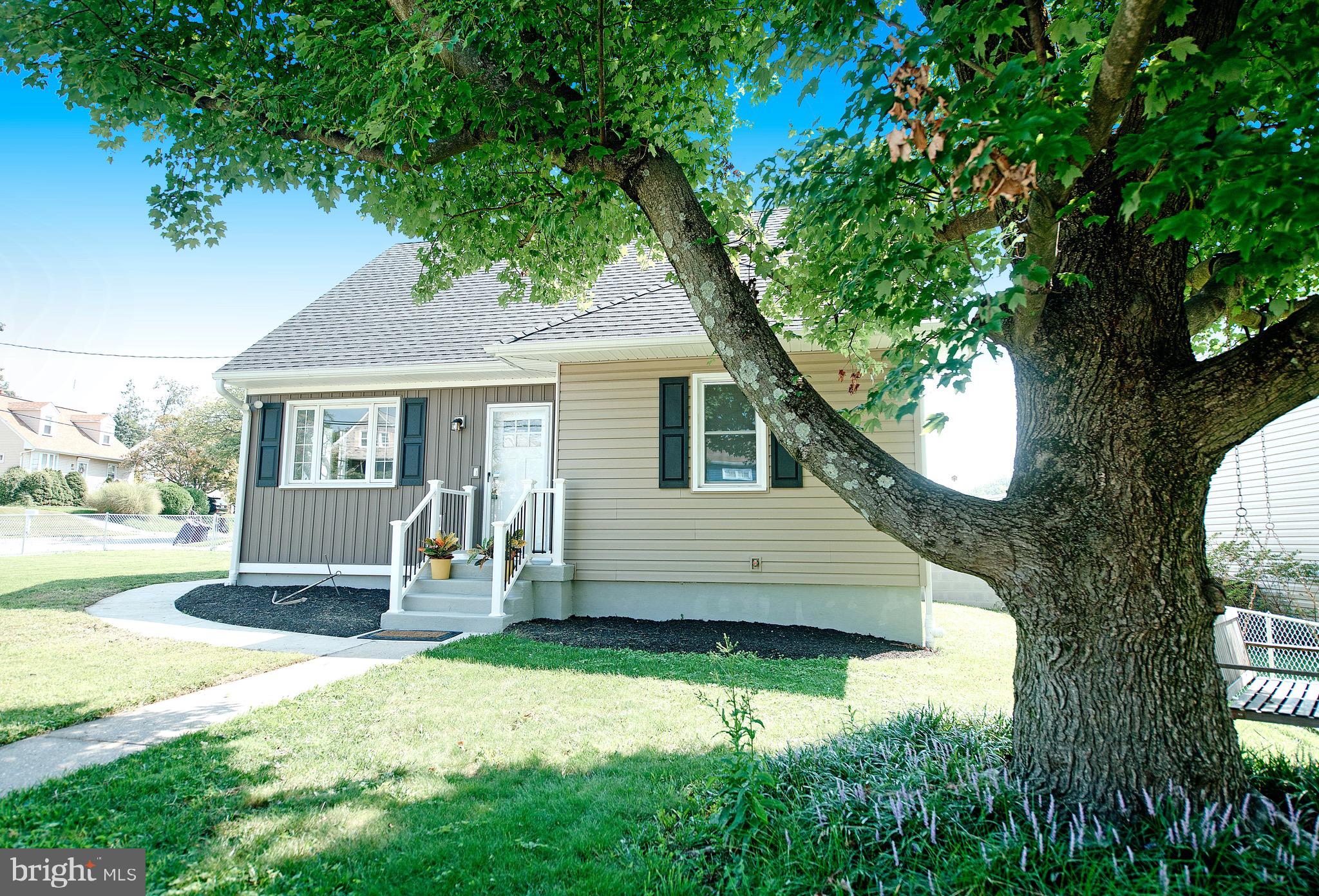 8205 Oakleigh Road Baltimore, MD 21234 - Photo 6 of 52 a view of a house with a yard