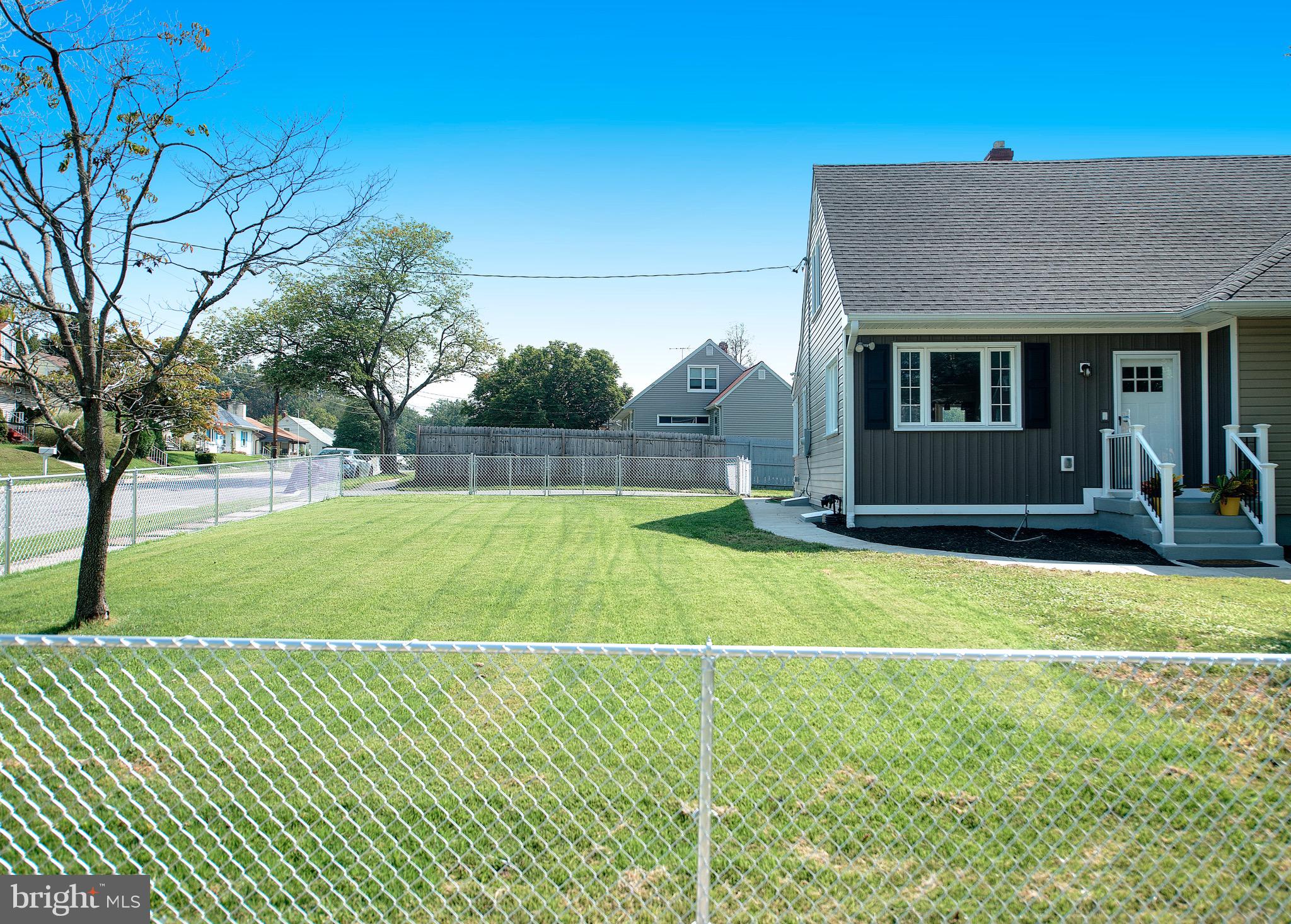 8205 Oakleigh Road Baltimore, MD 21234 - Photo 52 of 52 a view of a backyard with a garden