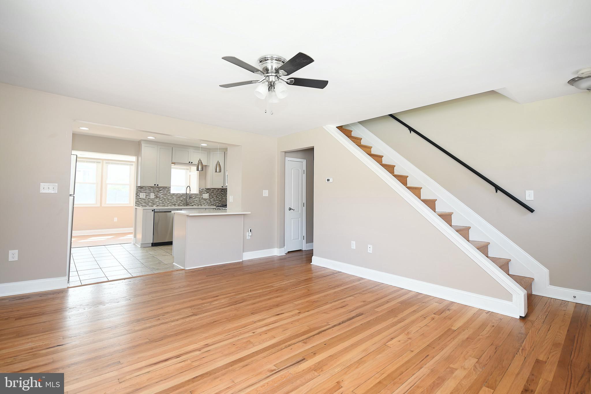 8205 Oakleigh Road Baltimore, MD 21234 - Photo 8 of 52 a view of a kitchen with wooden floor and a kitchen