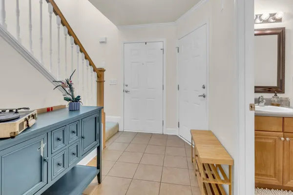 a view of entryway with wooden floor