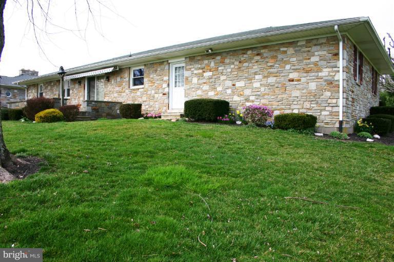 4603 Lower Beckleysville Road Hampstead, MD 21074 - Photo 27 of 28 There is pretty landscaping around the home.