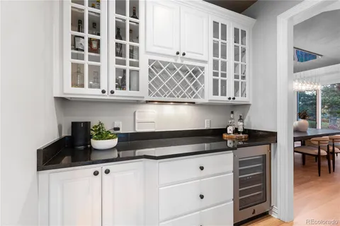 a kitchen with a stove and cabinets