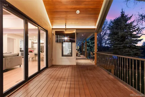 a view of gallery with wooden floor