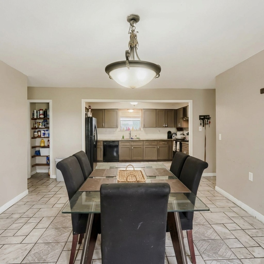 14520 Bois-D-Arc Road Manor, TX 78653 - Photo 19 of 21 a view of a dining room with furniture and wooden floor